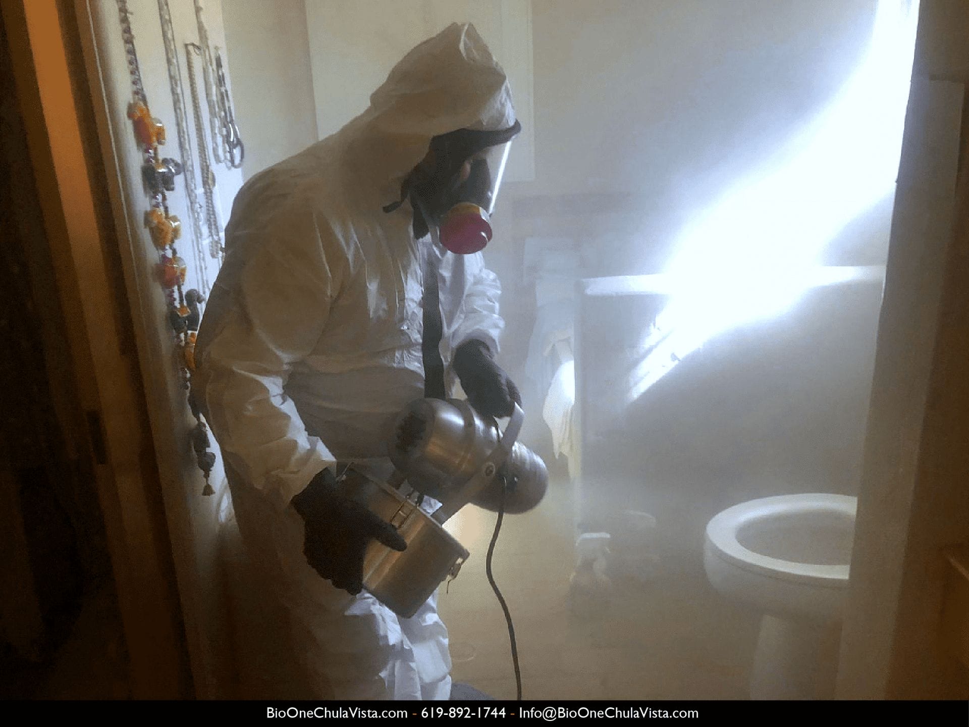 Image shows Bio-One using fogging technique to remove odors from a bathroom.