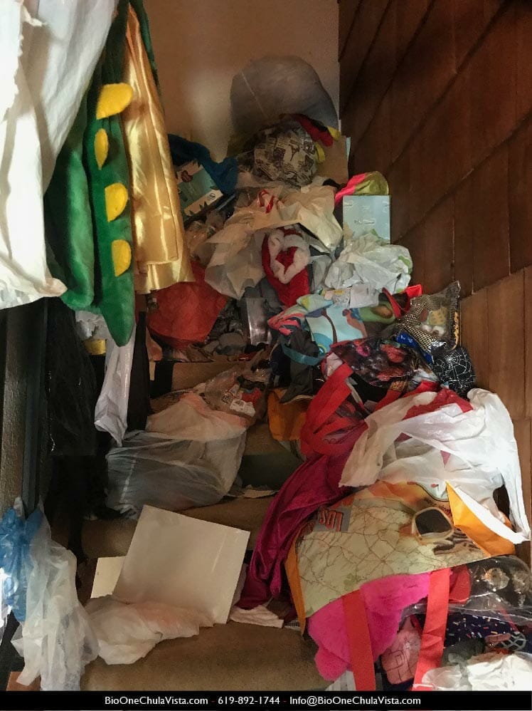 Inside of a hoarded home - Staircase. Photo credit: Bio-One Chula Vista.